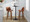 Tintori bar stool in Walnut Wood, Camel PU, Black Metal, featuring swivel and wood frame