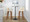 Toriano 30" Mid-Century Modern Fixed-Height Barstool with Swivel in Walnut Wood and Cream Faux Leather with Round Chrome Metal Footrest- Set of 2 — lifestyle photo 3