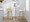 Toriano 30" Contemporary Fixed-Height Barstool with Swivel in Whitewashed Wood and Cream Faux Leather with Round Chrome Metal Footrest- Set of 2 — lifestyle photo 3
