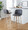 Toriano 30" Contemporary Fixed-Height Barstool with Swivel in Whitewashed Wood and Grey Faux Leather with Round Chrome Metal Footrest- Set of 2 — lifestyle photo 2
