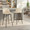 Toriano 30" Contemporary Fixed-Height Barstool with Swivel in Black Metal and Cream Faux Leather with Square Gold Metal Footrest- Set of 2 — lifestyle photo 1