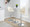 Ahoy Contemporary Adjustable Barstool with Swivel in Chrome Metal, Natural Bamboo Wood and Cream Faux Leather with Rounded T Footrest- Set of 2 — lifestyle photo 1