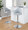 Ahoy Contemporary Adjustable Barstool with Swivel in Chrome Metal and Light Grey Fabric with Rounded T Footrest- Set of 2 — lifestyle photo 1