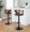 Cosi table in Black Metal, Walnut Wood, Charcoal Fabric, featuring swivel and adjustable height