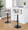 Cosi Mid-Century Modern Adjustable Barstool with Swivel in Black Metal, Light Grey Wood and Cream Faux Leather with Rounded T Footrest- Set of 2 — lifestyle photo 2