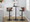 Cosi table in Black Metal, Walnut Wood, Brown PU, featuring swivel and adjustable height