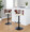 Cosi Mid-Century Modern Adjustable Barstool with Swivel in Black Metal, Walnut Wood and Cream Faux Leather with Rounded T Footrest- Set of 2 — lifestyle photo 2