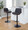 Corazza table in Black Metal, Walnut Wood, Charcoal Fabric, featuring swivel and adjustable height