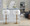 Dahlia Contemporary Adjustable Barstool in Gold Metal and Cream Velvet with Gold Metal Accent and Round Metal Footrest- Set of 2 — lifestyle photo 2