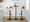 Elisa Mid-Century Modern Adjustable Barstool with Swivel in Black Metal, Walnut Wood and Cream Fabric with Rounded T Footrest- Set of 2 — lifestyle photo 4