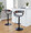 Elisa Mid-Century Modern Adjustable Barstool with Swivel in Black Metal, Walnut Wood and Grey Fabric with Rounded T Footrest- Set of 2 — lifestyle photo 2