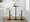Folia Contemporary Adjustable Barstool with Swivel in Black Metal, Natural Wood and Cream Faux Leather with Rounded T Footrest- Set of 2 — lifestyle photo 4