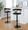 Gardenia table in Whitewashed Wood, Black Metal, Charcoal Fabric, featuring swivel and upholstered seat