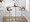 Gardenia Mid-Century Modern Adjustable Barstool with Swivel in Chrome Metal, Walnut Wood and Light Grey Fabric with Rounded T Footrest- Set of 2 — lifestyle photo 1
