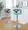 Gardenia Mid-Century Modern Adjustable Barstool with Swivel in Chrome Metal, Walnut Wood and Teal Fabric with Rounded T Footrest- Set of 2 — lifestyle photo 3