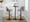 Gianna Mid-Century Modern Adjustable Barstool with Swivel in Black Metal, Walnut Wood and Light Grey Faux Leather with Rounded T Footrest- Set of 2 — lifestyle photo 4