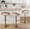 Grotto Contemporary Adjustable Barstool with Swivel in Gold Metal, Whitewashed Wood, and Oat Fabric with Rounded T Footrest — lifestyle photo 3