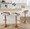 Grotto Contemporary Adjustable Barstool with Swivel in Gold Metal, Whitewashed Wood, and Oat Fabric with Rounded T Footrest — lifestyle photo 4