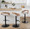 Grotto Contemporary Adjustable Barstool in Black Metal, Whitewashed Wood, and Oat Fabric with Rounded T Footrest — lifestyle photo 4