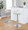 Grotto table in Chrome Metal, Natural Wood, Light Green Fabric, featuring swivel and adjustable height