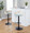 Grotto Contemporary Adjustable Barstool with Swivel in Black Metal, Natural Wood and Light Green Fabric with Rounded T Footrest- Set of 3 — lifestyle photo 1
