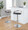 Grotto table in Chrome Metal, Light Grey Wood, Black PU, featuring swivel and adjustable height