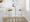 Grotto Contemporary Adjustable Barstool in Chrome Metal, Natural Wood and Grey Faux Leather with Rounded T Footrest — lifestyle photo 3
