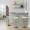 Grotto Contemporary Adjustable Barstool in Gold Metal, Light Grey Wood, and White Faux Leather with Rounded T Footrest- Set of 2 — lifestyle photo 2