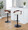 Grotto table in Black Metal, Walnut Wood, Cream PU, featuring swivel and adjustable height