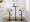 Grotto Contemporary Adjustable Barstool with Swivel in Black Metal, Natural Wood and Brown Faux Leather with Rounded T Footrest- Set of 3 — lifestyle photo 4