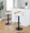 Grotto table in Black Metal, Zebra Wood, White PU, featuring swivel and adjustable height
