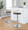Grotto table in Chrome Metal, Natural Wood, Brown PU, featuring swivel and adjustable height