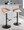 Grotto table in Black Metal, Zebra Wood, White PU, featuring swivel and adjustable height