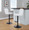 Henry Contemporary Adjustable Barstool with Swivel in Black Metal and White Fabric with Rounded T Footrest- Set of 2 — lifestyle photo 1