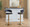 Jie table in Gold Metal, Black PU, featuring swivel and adjustable height
