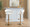 Jie table in Gold Metal, White PU, featuring swivel and adjustable height