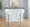 Jie table in Chrome Metal, White PU, featuring swivel and adjustable height