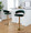 Jie Contemporary Adjustable Barstool with Swivel in Gold Metal and Green Velvet with Rounded T Footrest- Set of 2 — lifestyle photo 1