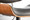 Lombardi Mid-Century Modern Adjustable Barstool with Swivel in Walnut with Grey Faux Leather- Set of 2 — lifestyle photo 3