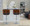 Lombardi Mid-Century Modern Adjustable Barstool with Swivel in Chrome Metal, Walnut Wood and Espresso Faux Leather with Straight T Footrest- Set of 2 — lifestyle photo 2