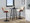 Lombardi Mid-Century Modern Adjustable Barstool with Swiviel in Black Metal, Walnut Wood and Cream Faux Leather with Straight T Footrest- Set of 3 — lifestyle photo 4