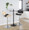 Lombardi Contemporary Adjustable Barstool with Swivel in Chrome Metal, Natural Wood and Black Faux Leather with Straight T Footrest- Set of 2 — lifestyle photo 2