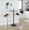 Lombardi Contemporary Adjustable Barstool with Swivel in Chrome Metal, Natural Wood and Camel Faux Leather with Straight T Footrest- Set of 2 — lifestyle photo 1
