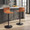 Mara table in Black Metal, Camel PU, featuring swivel and adjustable height