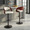 Pino Mid-Century Modern Adjustable Barstool with Swivel in Black Metal, Mahogany Wood and White Faux Leather with Rounded T Footrest- Set of 2 — lifestyle photo 3