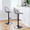 Riley Farmhouse Adjustable Barstool with Swivel in Black Metal, Black Wood and Black Faux Leather with Rounded T Footrest- Set of 2 — lifestyle photo 3