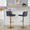 Santi Upholstered Contemporary Adjustable Barstool with Swivel in Gold Metal and Grey Faux Leather with Rounded T Footrest- Set of 2 — lifestyle photo 1