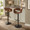 Curvo table in Black Metal, Walnut Wood, Espresso PU, featuring swivel