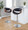 Curvo table in Chrome Metal, Walnut Wood, Grey PU, featuring swivel and adjustable height