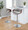 Curvo table in Chrome Metal, Walnut Wood, Grey PU, featuring swivel and adjustable height